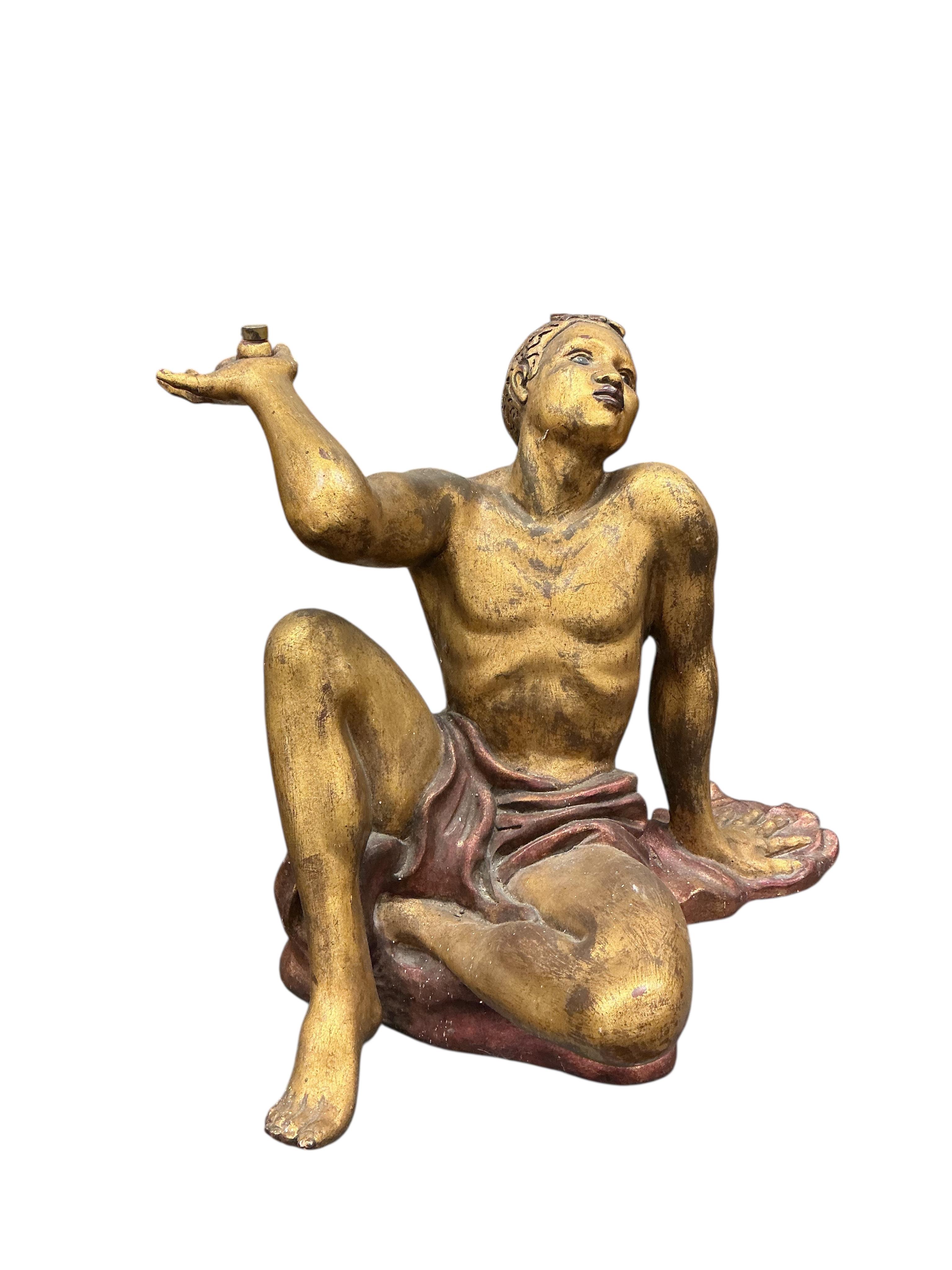 A pair of Venetian style painted carved wood seated Blackamoor figural table supports, height 54cm